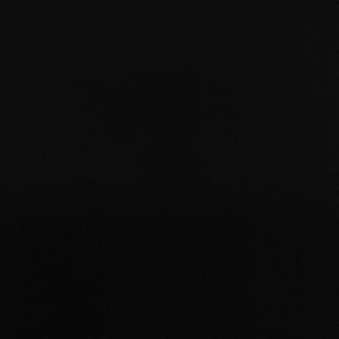 Soft black Mul-Mul plain cotton fabric close up