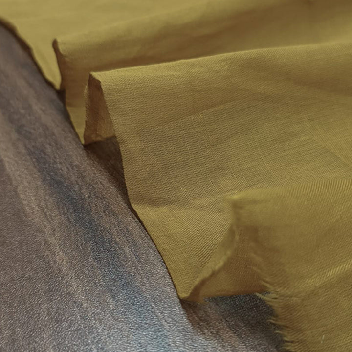 Soft Mustard Yellow Mulmul Plain Cotton Fabric from Fabrics@StudioLCX