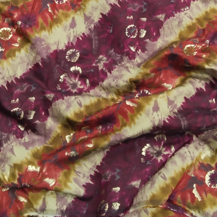 Trendsetting maroon stripes on muslin fabric, combining fashion-forward design with the softness and versatility of muslin for stylish garments.