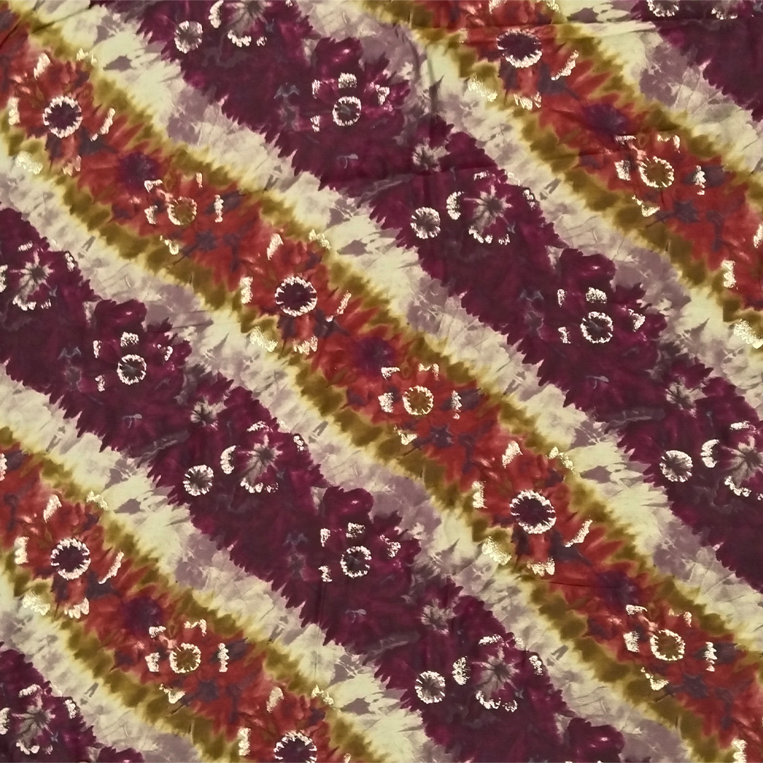 Trendsetting maroon stripes on muslin fabric, combining fashion-forward design with the softness and versatility of muslin for stylish garments.