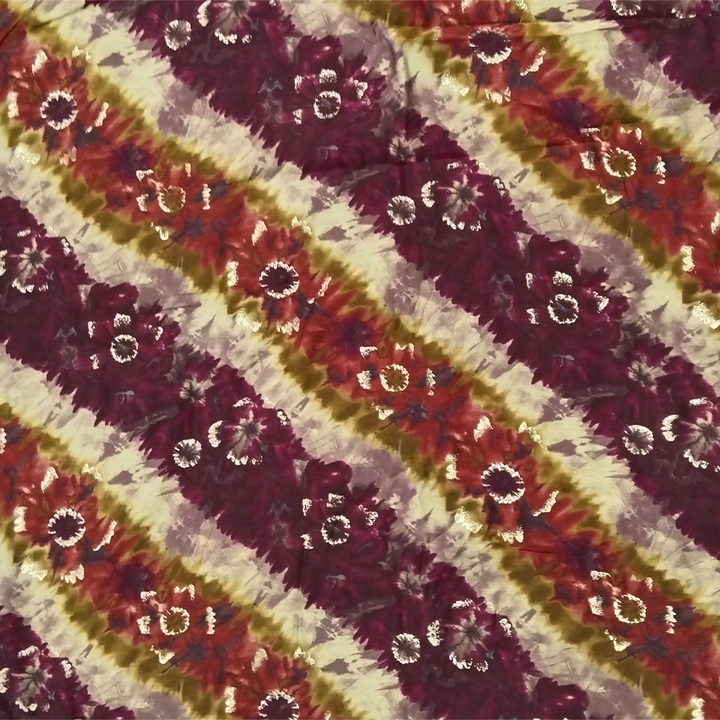 Trendsetting maroon stripes on muslin fabric, combining fashion-forward design with the softness and versatility of muslin for stylish garments.