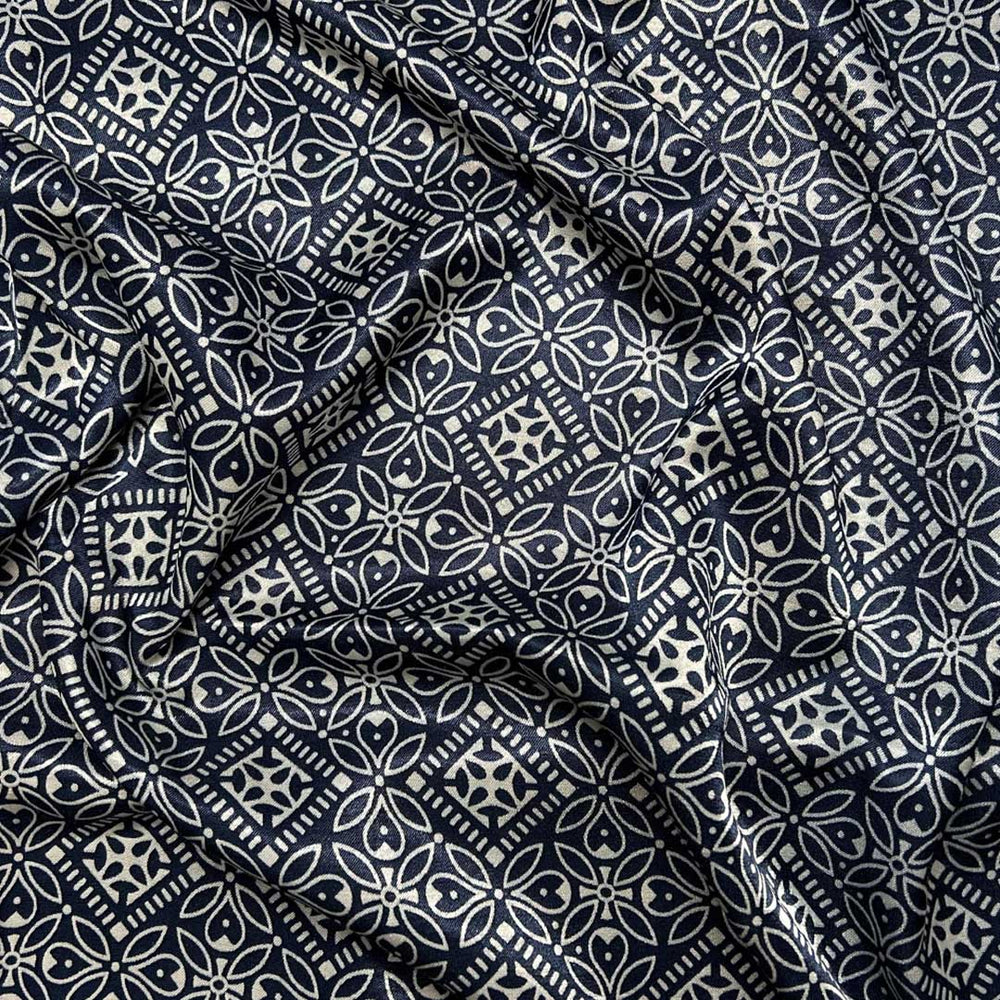 Sophisticated navy blue Mashru silk fabric with intricate floral prints for premium fashion crafting at Fabrics @StudioLCX.