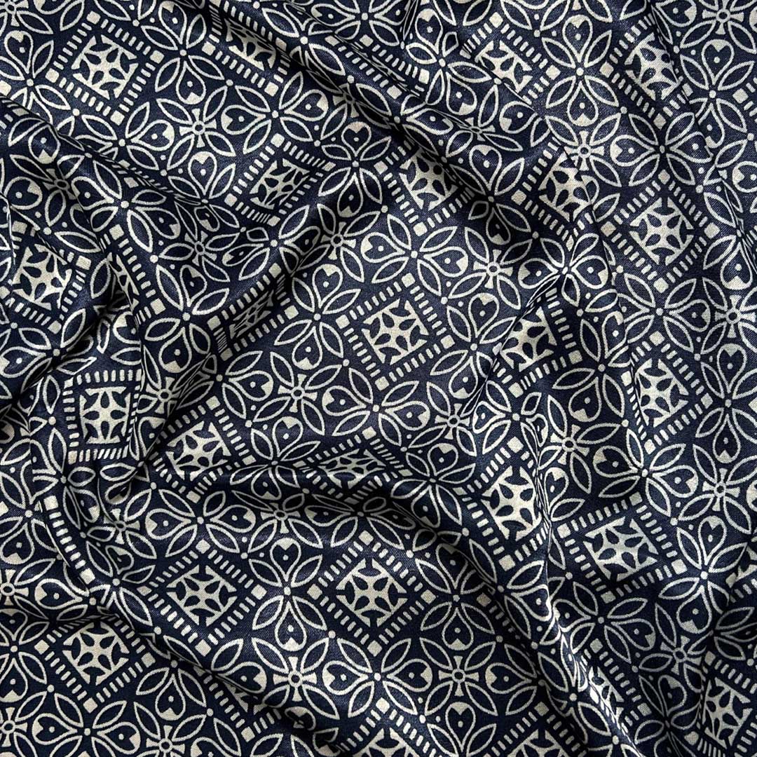 Sophisticated navy blue Mashru silk fabric with intricate floral prints for premium fashion crafting at Fabrics @StudioLCX.
