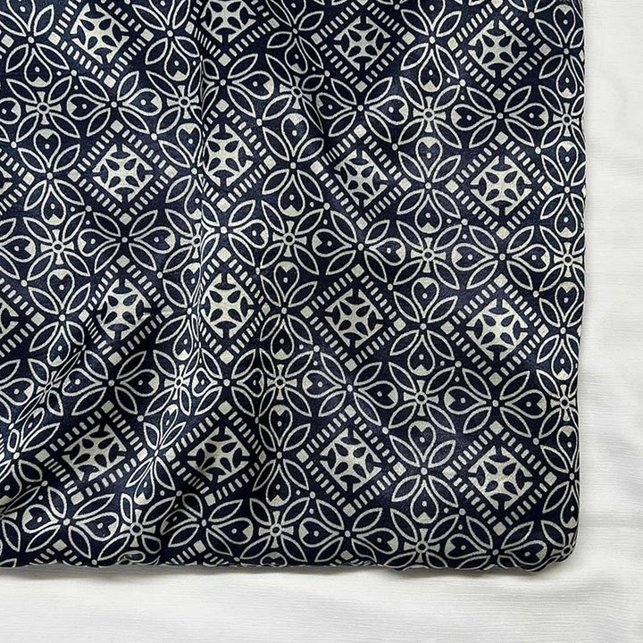 Sophisticated navy blue Mashru silk fabric with intricate floral prints for premium fashion crafting at Fabrics @StudioLCX.